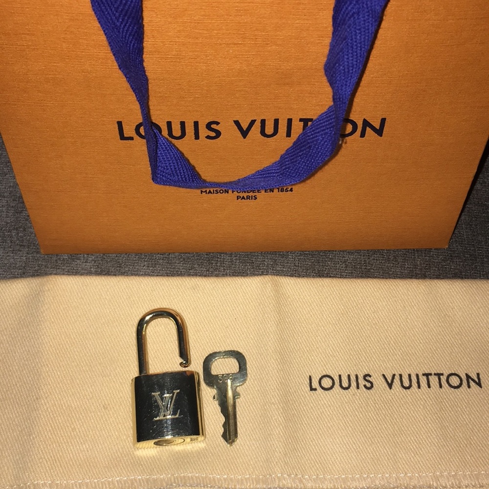 Louis Vuitton authentic brass padlock & key #306